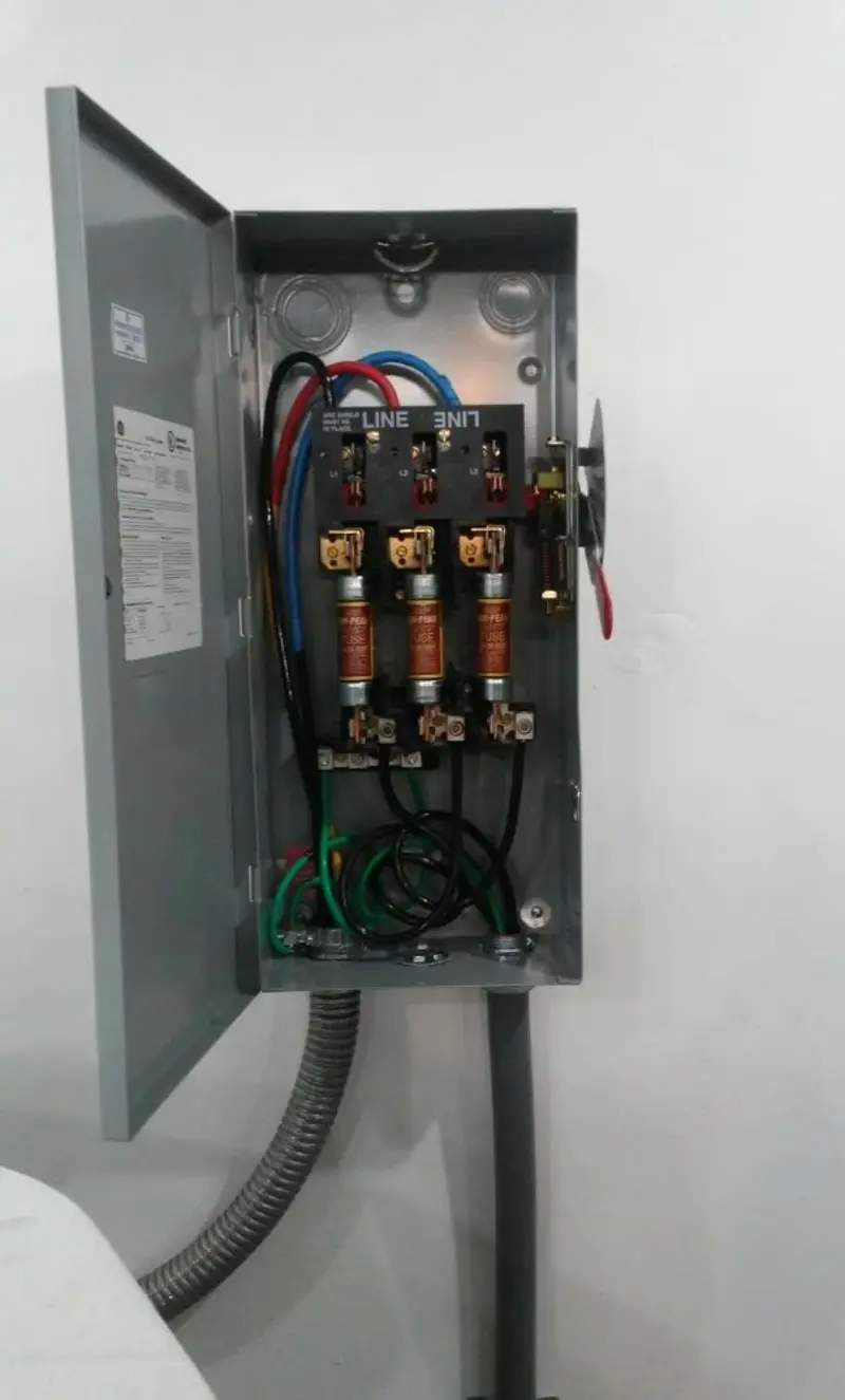 Three-phase disconnect switch installed for Smoke Detector Installation in Liberty